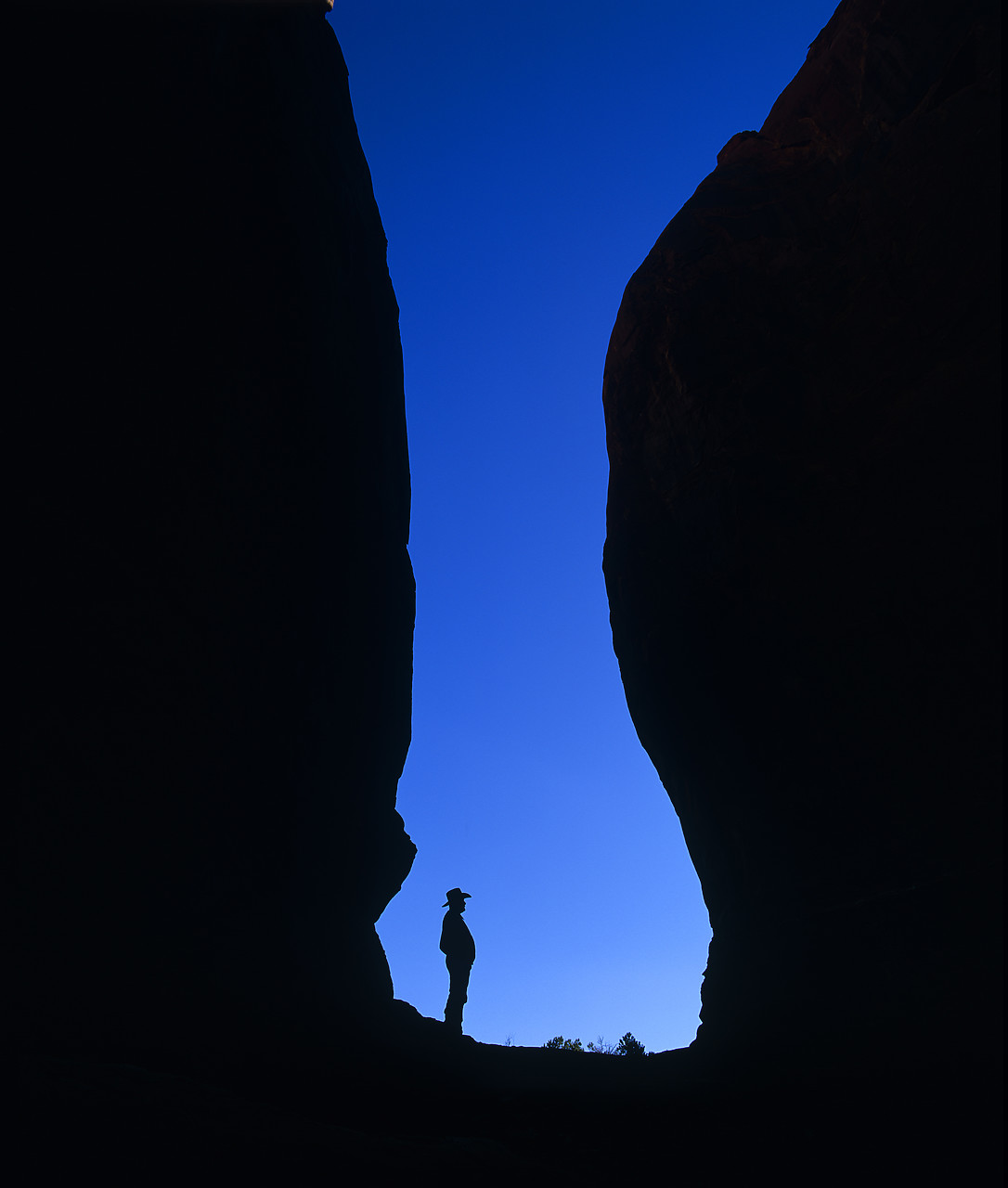 #010740-3 - Silhouette of Cowboy, Mystery Valley, Monument Valley, Arizona, USA