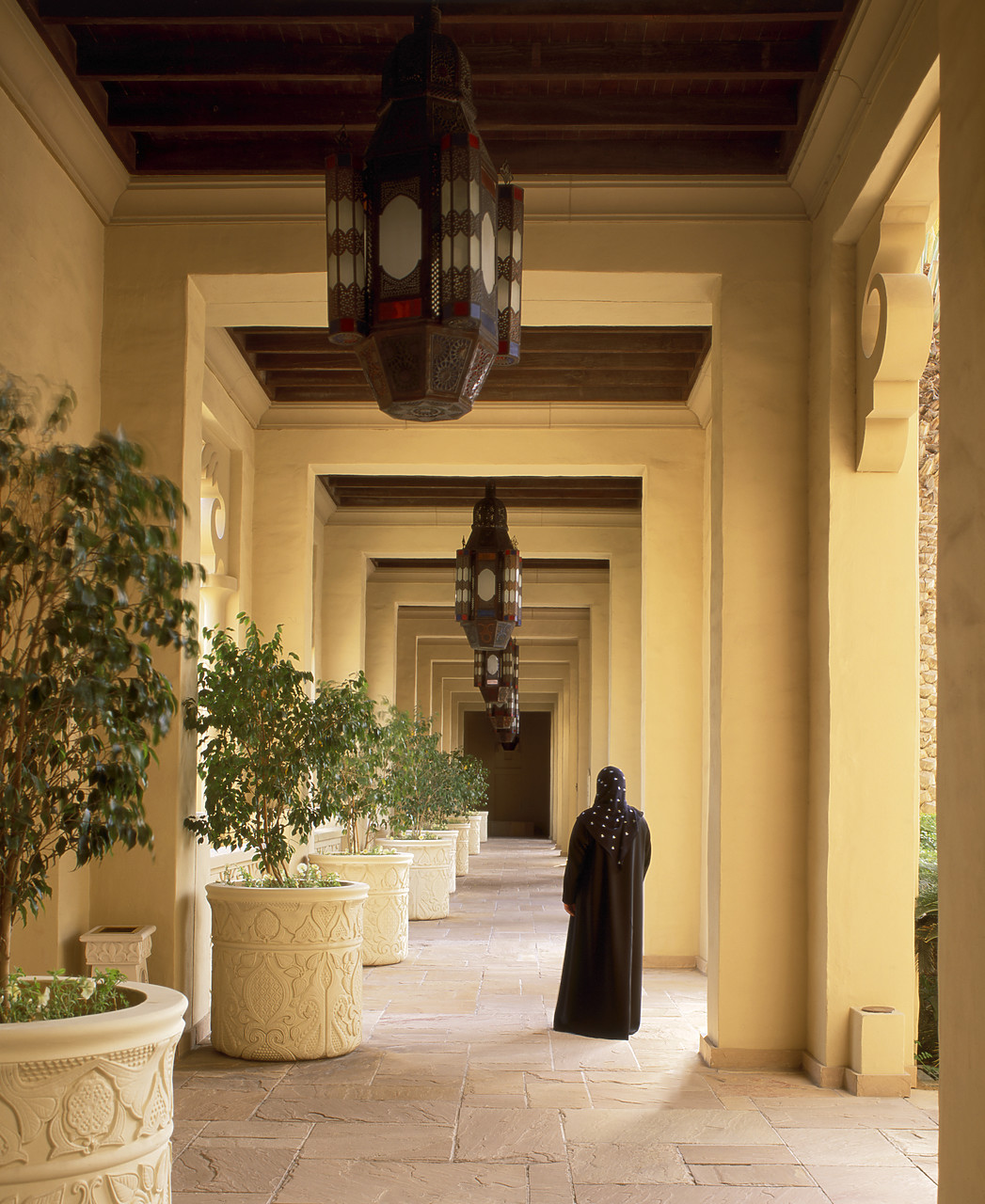 #050037-1 - Local Arab Woman in Corridor, Royal Mirage Hotel, Dubai, UAE
