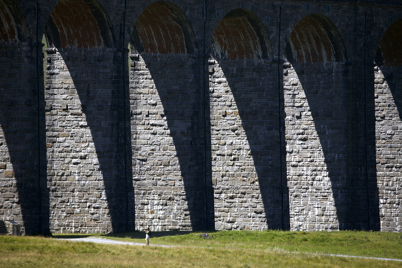 #060126-1 - Person under Ribblehead Viaduct, Yorkshire Dales, England