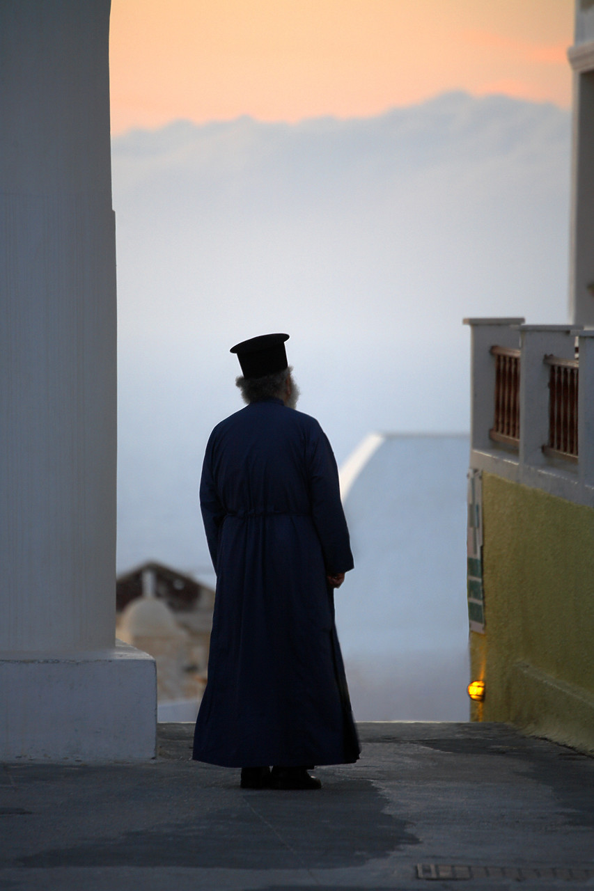 #060250-1 - Silhouette of Greek Priest, Oia, Santorini, Greece