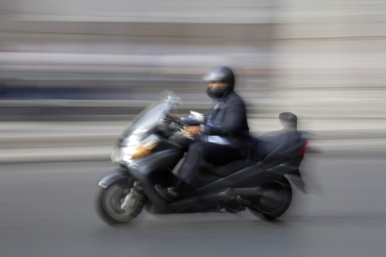 #060422-1 - Panned Image of Business Man on Motorbike, Rome, Italy