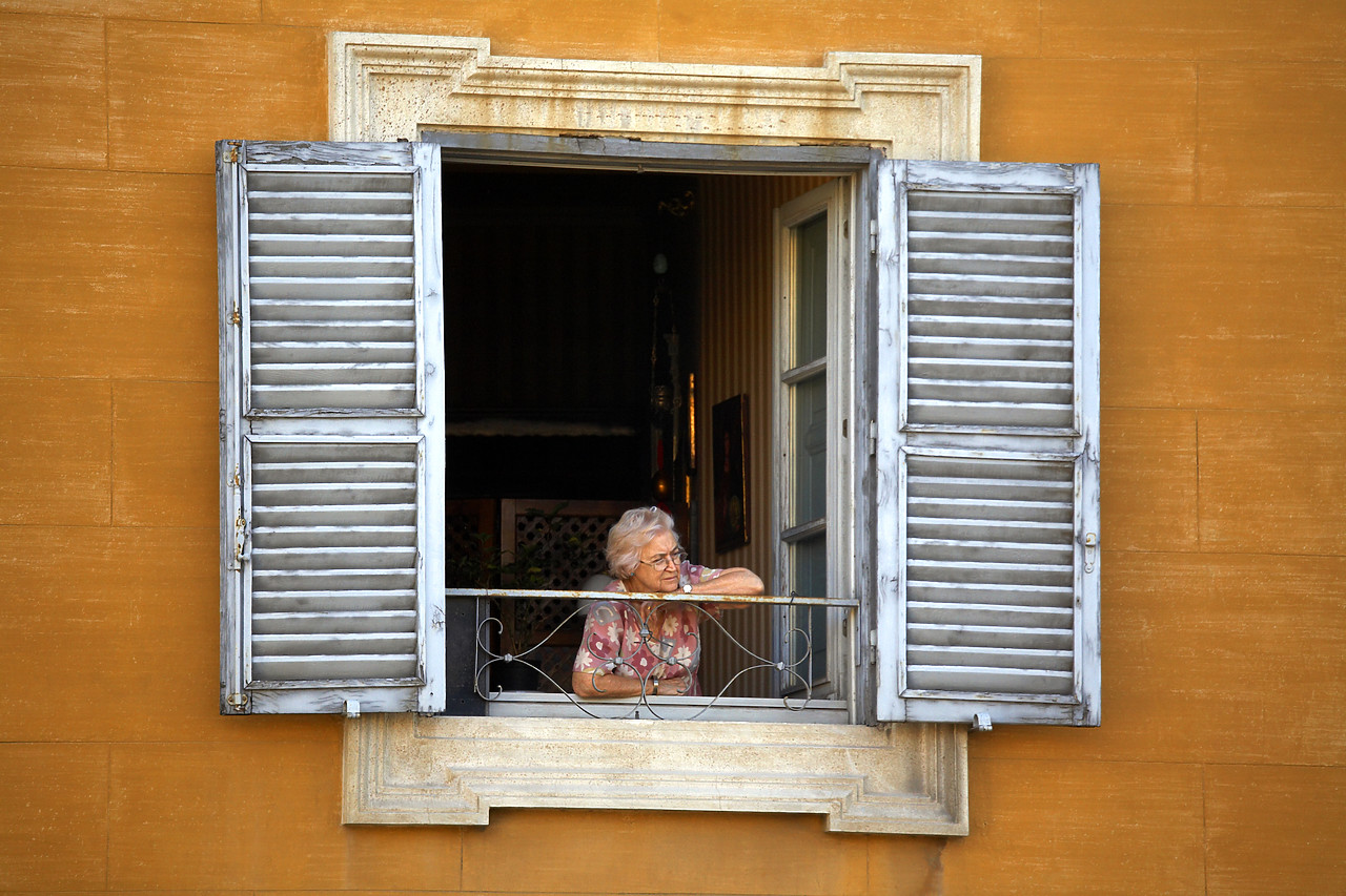 #060427-2 - Old Woman looking out of Window, Rome, Italy