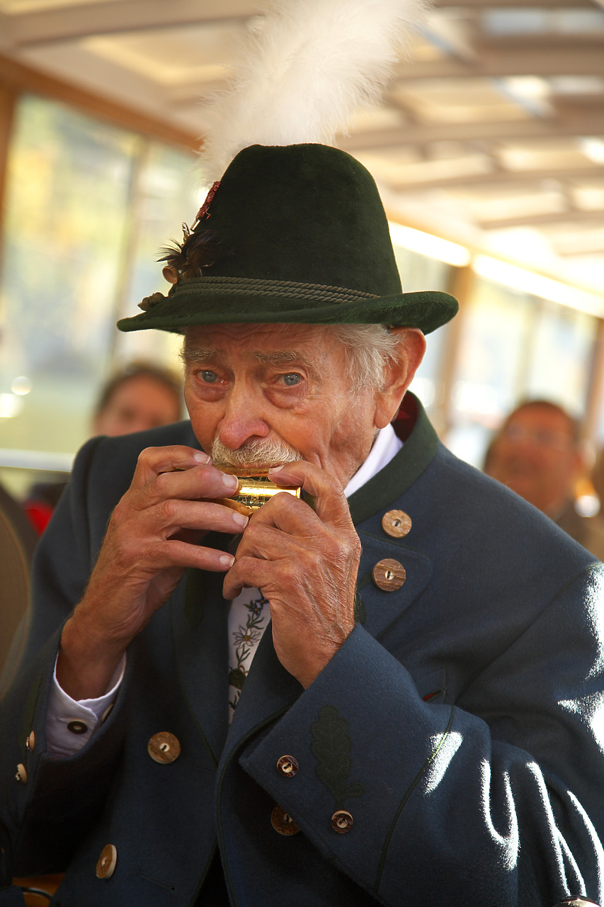 #060508-1 - Elderly German Man playing Harmonica, Germany