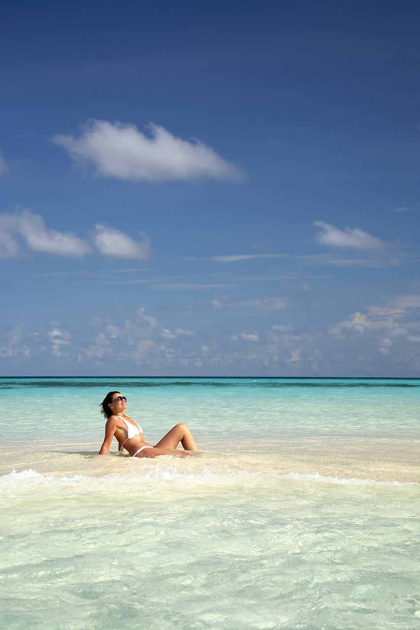 #080058-2 - Woman Sitting in Shallow Water, Kuredu, Maldives