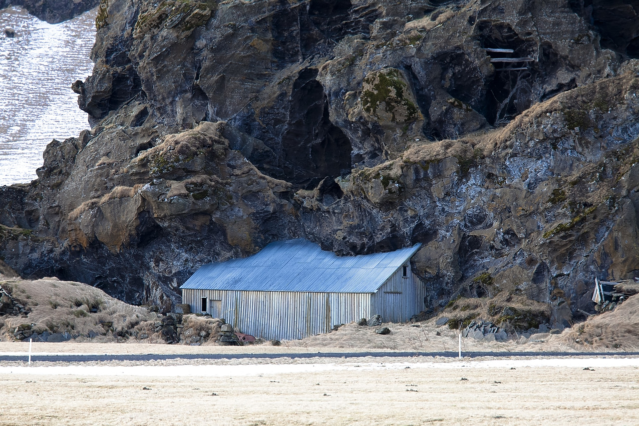 #100122-1 - Building Partially Covered by Lava, Iceland