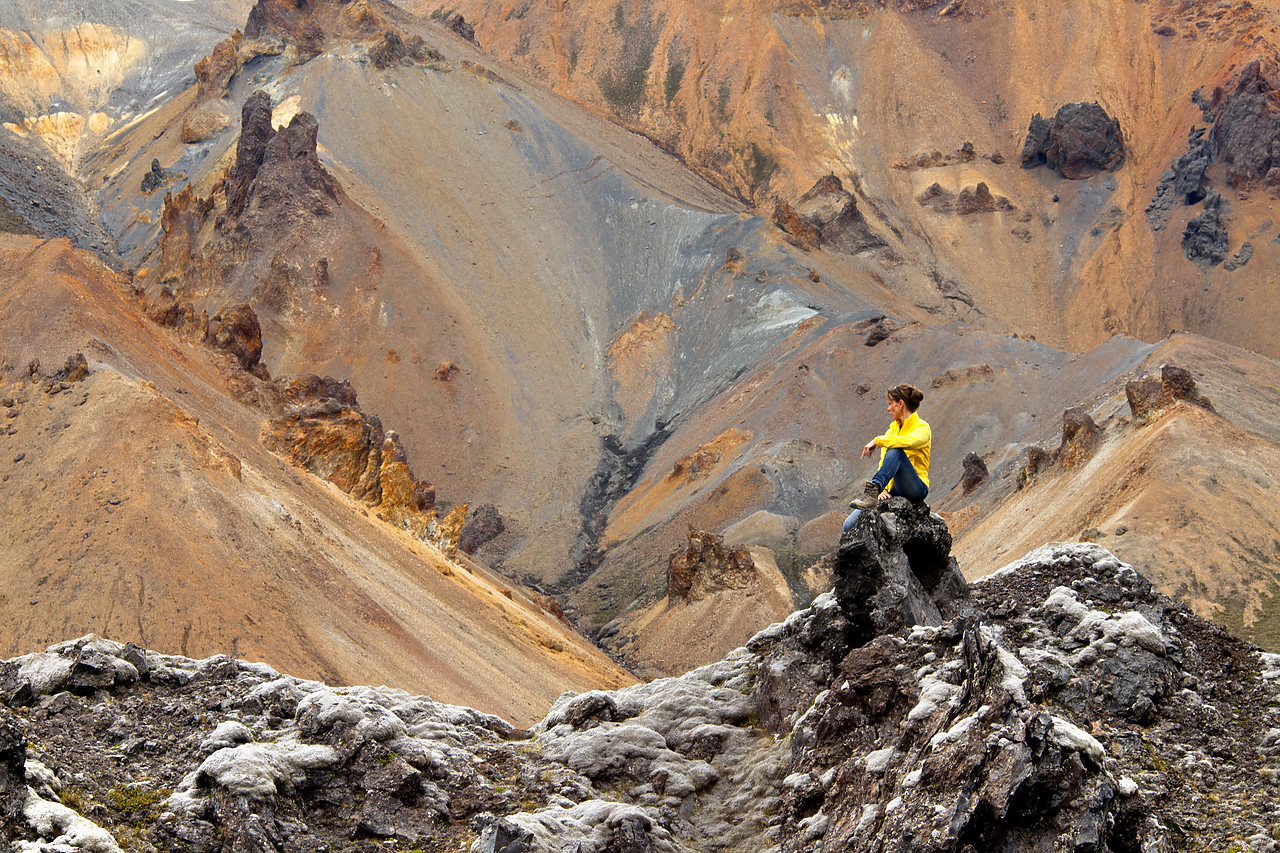 #100242-1 - Woman overlooking Landmannalaugar, Iceland