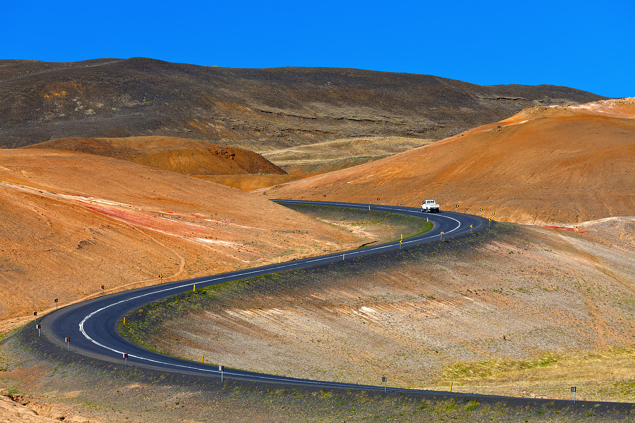 #100285-1 - Truck on Winding Road, Namafjall hverir, Iceland