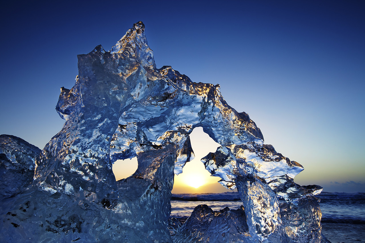 #110106-1 - Iceberg Sculpture at Sunrise, Jokulsarlon Beach, Iceland