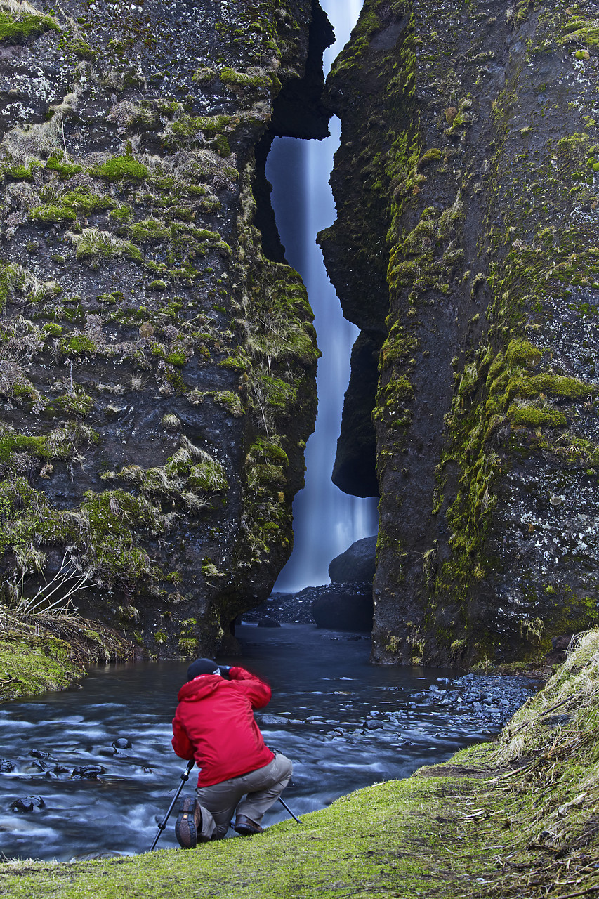 #110115-1 - Person Taking Pictures of Waterfall, Iceland