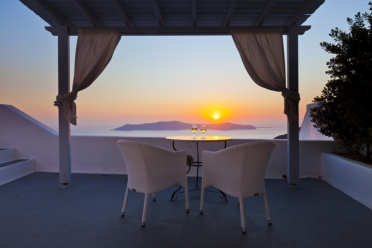 #110271-1 - Two Chairs & Wine Glasses overlooking Sea at Sunset, Fira, Santorini, Cyclade Islands, Greece