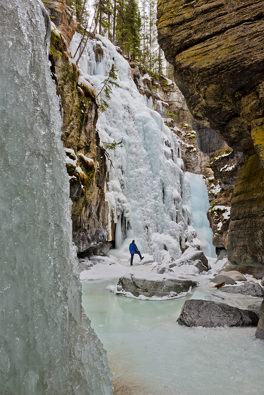 #130052-1 - Man & Frozen Waterfall in Maligne Canyon, Jasper National Park, Alberta, Canada