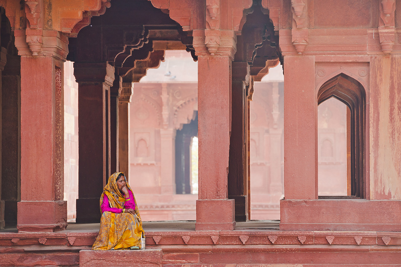 #130147-1 - Indian Woman Sitting in Archway, Jodha Bai's Palace, Fatehpur Sikri, Agra, India