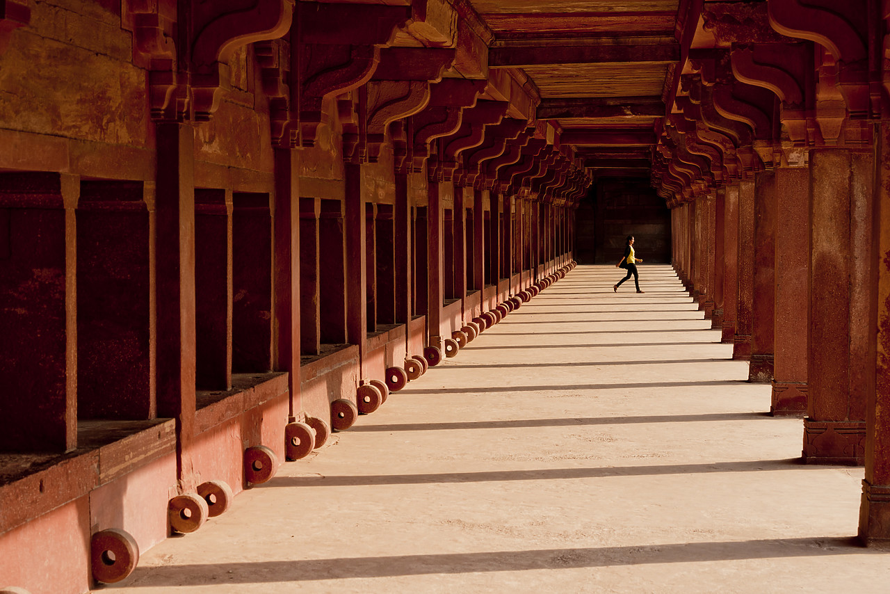 #130152-1 - Woman Walking Across Corridor, Jodha Bai's Palace, Fatehpur Sikri, Agra, India