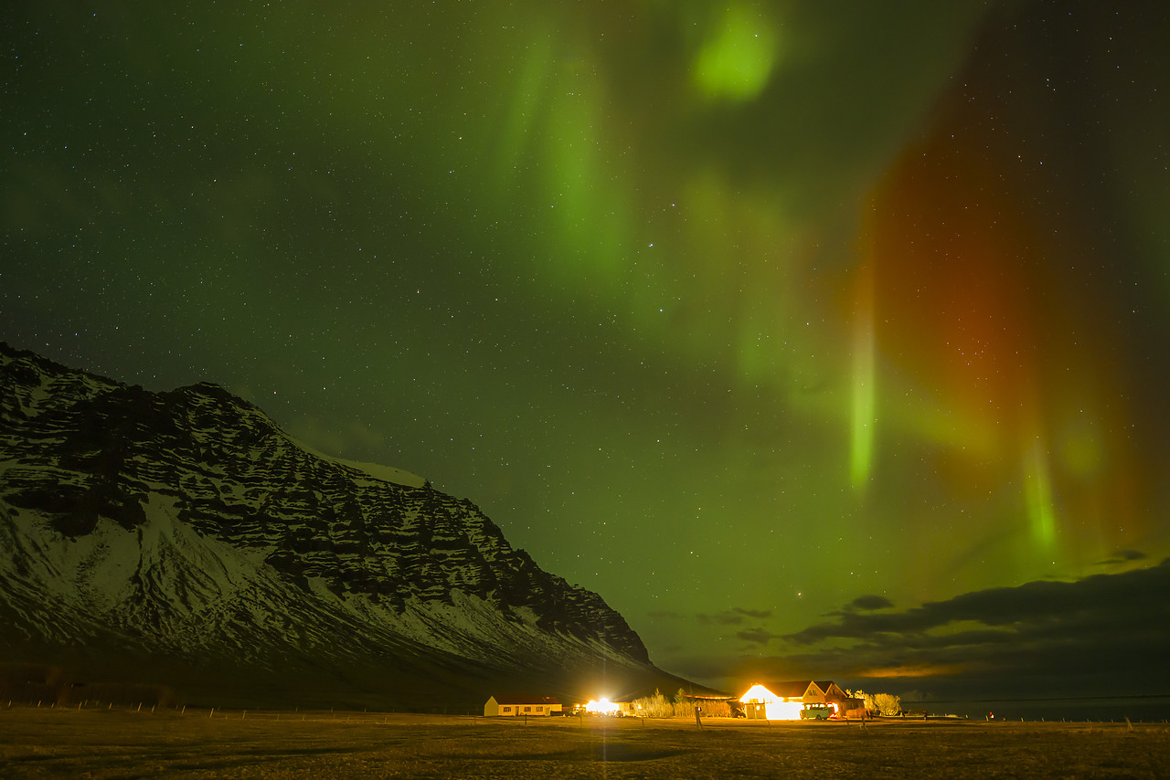 #140030-1 - Aurora Borealis or Northern lights Over Mountains & Farmouse, Iceland