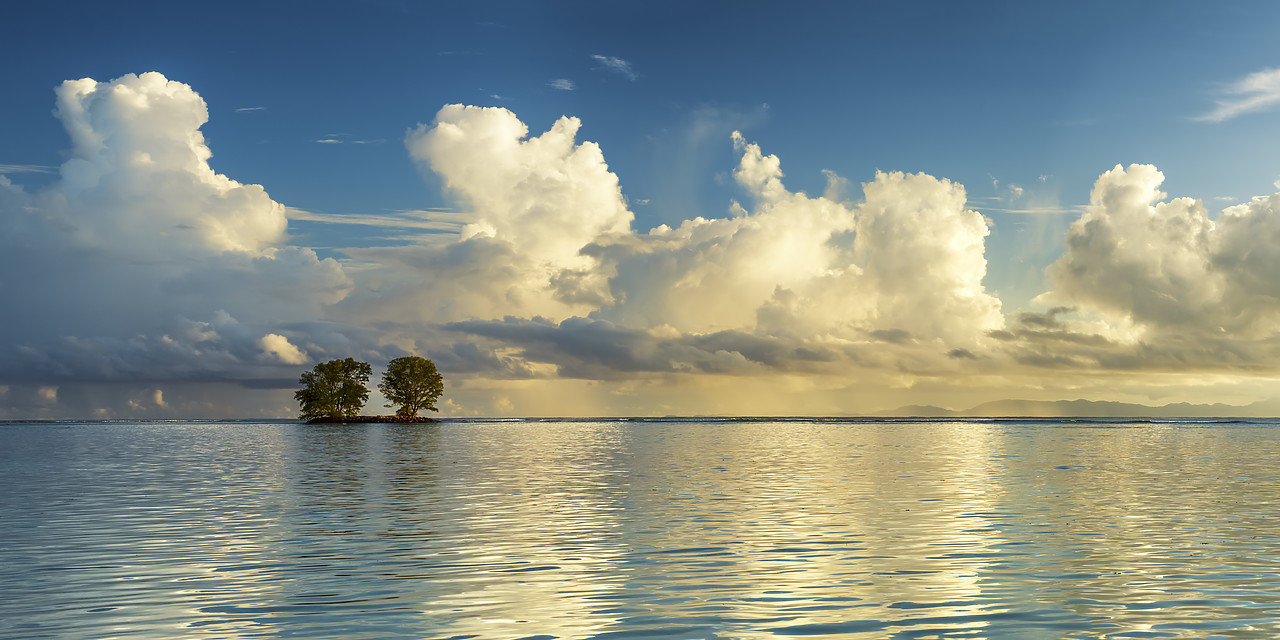 #150238-1 - Cloud Formation over Two Trees on Island, La Digue, Seychelles
