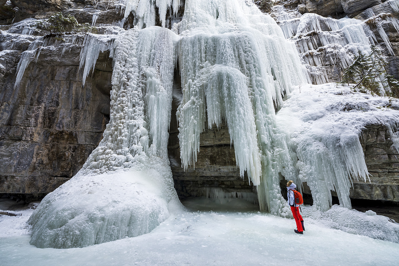 #170048-1 - The Queen Frozen Waterfall & Woman, Maligne Canyon, Jasper National Park, Alberta, Canada