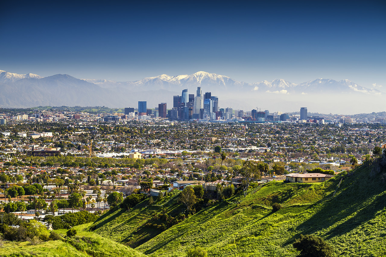 #170220-1 - Los Angeles Skyline and Snow Capped San Gabriel Mountains, California, USA