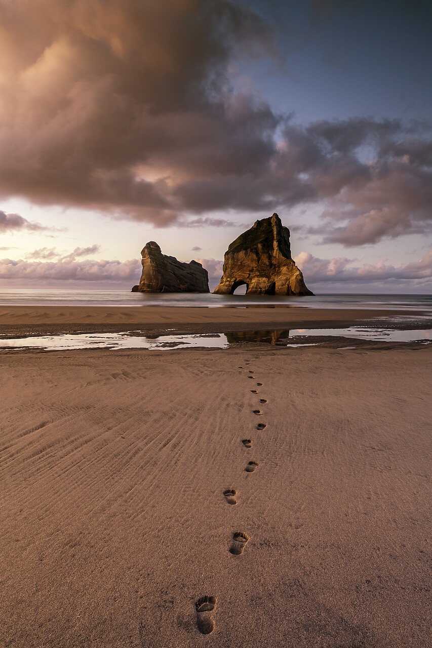 #220912-1 - Footprints leading to Archway Islands, Wharariki Beach, South Island, New Zealand