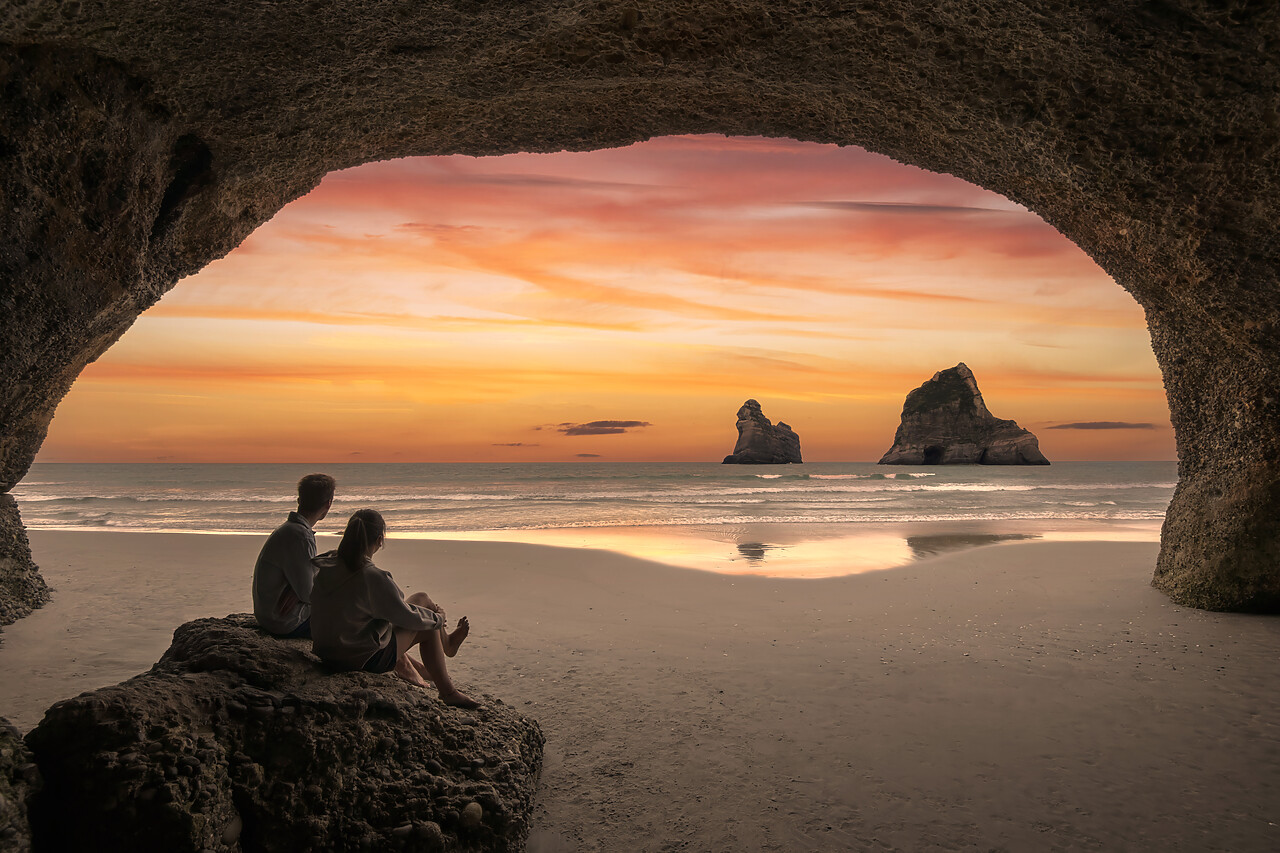 #240069-1 - Couple Enjoying Sunset over Archway Islands, Wharariki Beach, South Island, New Zealand