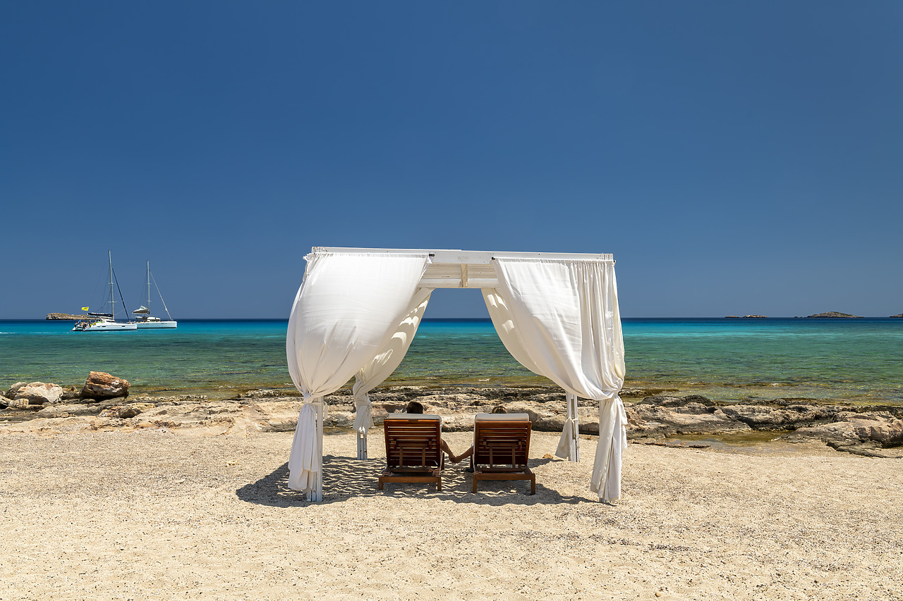 #410287-1 - Cabana & Couple on Sunbeds on Beach,  Rhodes, Dodecanese Islands, Greece