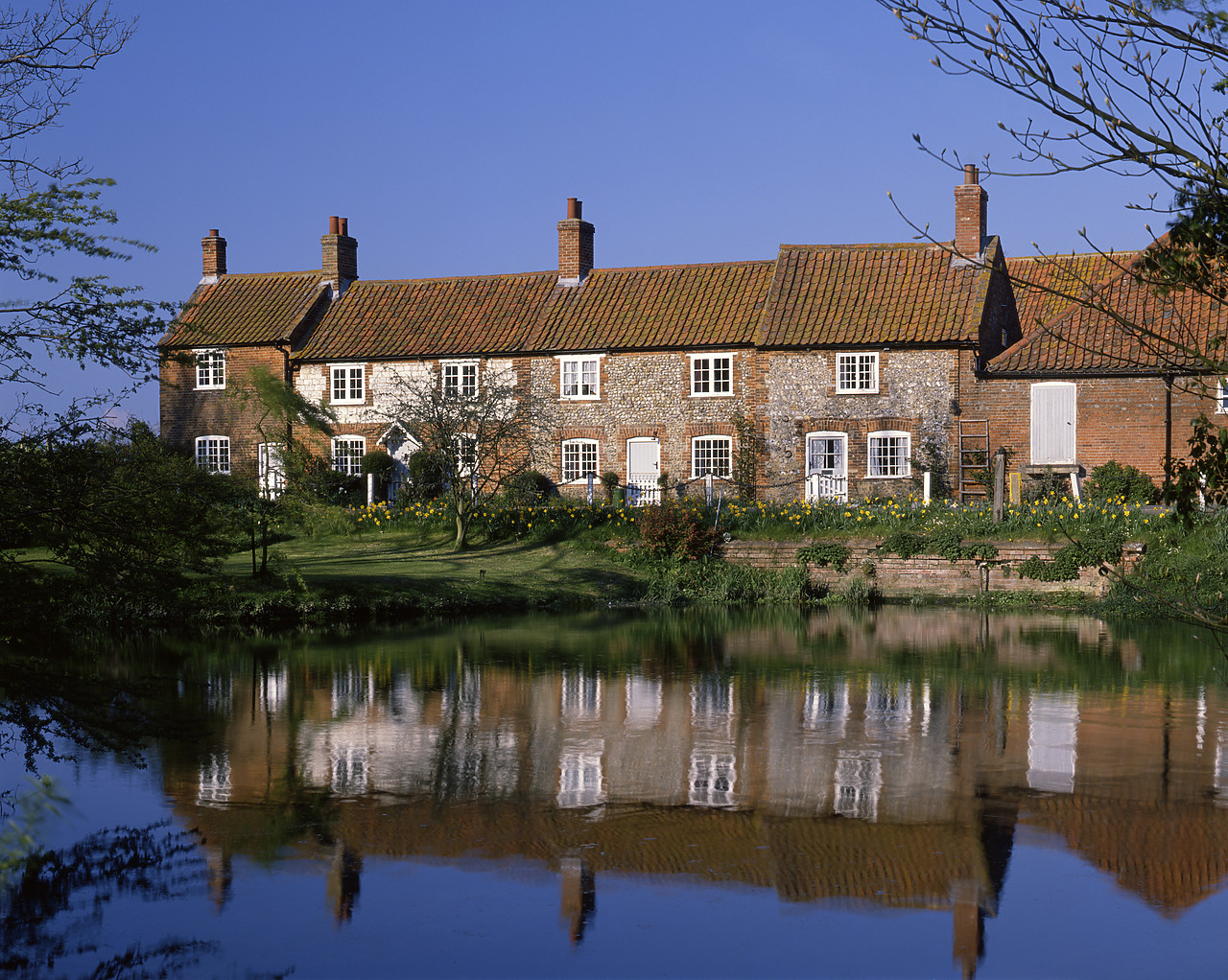 #902731 - Flint Cottages Reflecting in River Burn, Burnham Overy, Norfolk, England