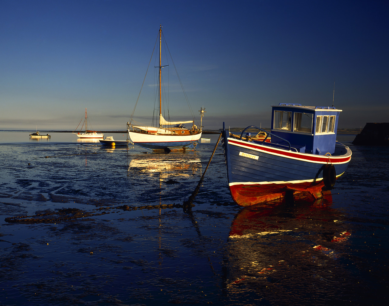 #913642 - Boats at Low Tide, Holy Island, Northumberland, England