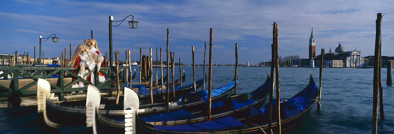 #990040-1 - Gondolas & couple in costume, Venice, Italy